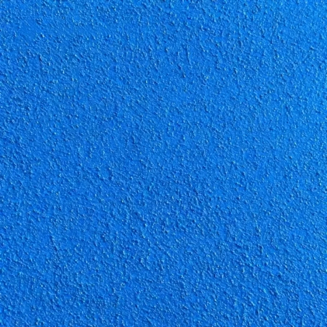 Durable acrylic surface layer of pickleball court flooring mat