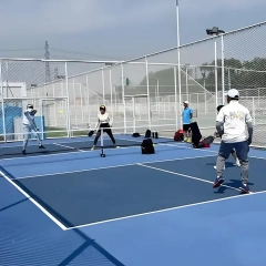 Outdoor pickleball court using acrylic PVC flooring mat system