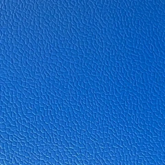 Close-up view of three-dimensional stone pattern surface texture on pickleball flooring