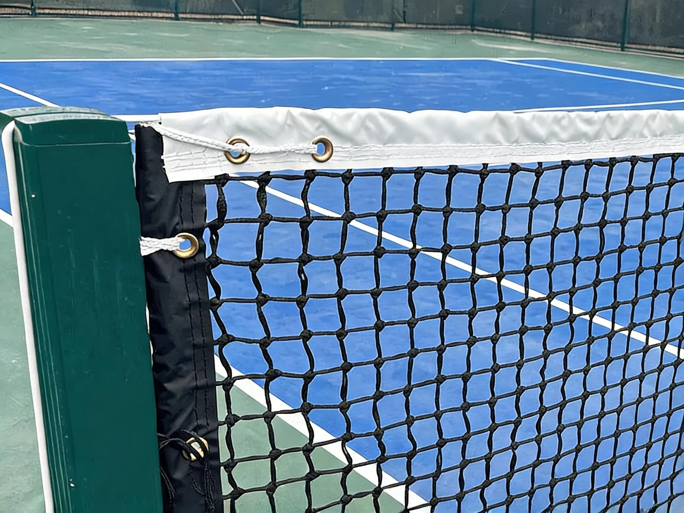 Close-up engineering view of the four rows of heavy lock-stitching on the white PVC headband joined securely to the double-layer HDPE mesh body.