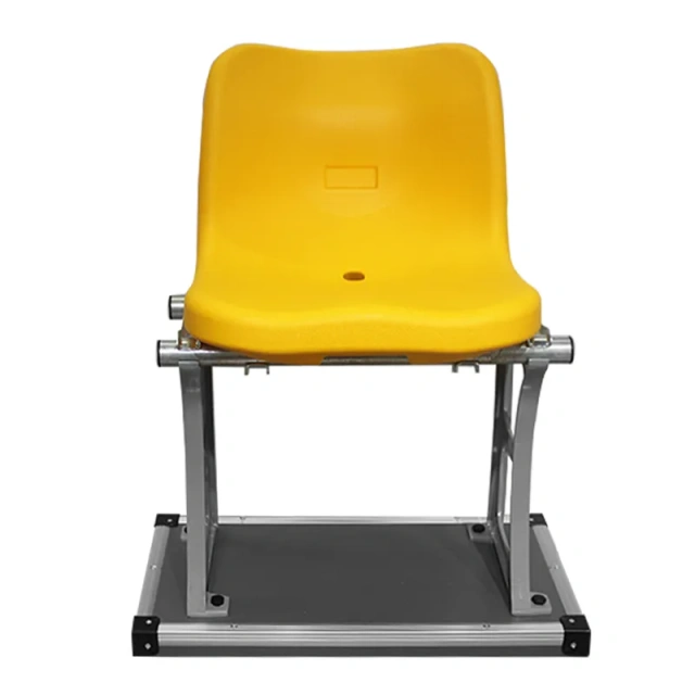 Close-up detail of Eco-M HDPE 5502 blow molded stadium seat surface showing anti-UV treated polymer texture, twin-wall edge section, and raw material color and finish characteristics