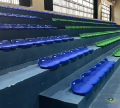 Side-by-side material comparison of HDPE 5502 blow molded stadium seat versus polypropylene stadium seat, showing structural wall profile, surface finish, and color differentiation