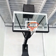 Close-up of FIBA Level 1 portable basketball hoop electric hydraulic fold system and automated movement wheel chassis, showing one-touch lift mechanism components, heavy-duty electric control wheel assembly, and structural frame connection for automated stadium floor transport