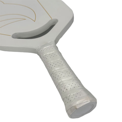 Close-up detail view showing the flush water label application along the molded Edgeless guard edge of the Edgeless Pickleball Paddle frame perimeter.