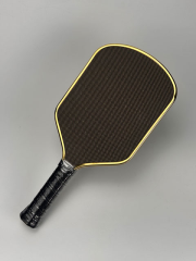 High-definition face close-up showing custom logo application via industrial UV print/custom surface finish system on the TITANIUM Pickleball Paddle face plate.