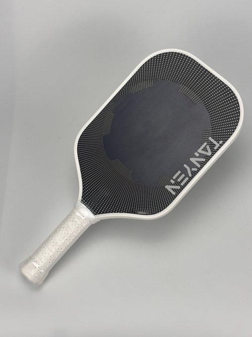 High-magnification close-up of the T700 carbon fiber woven face panel texture on the SX-CP-T paddle, showing raw weave composition and surface structural integrity for OEM sourcing evaluation.