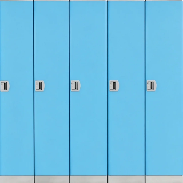 Tall equipment storage cabinet installed in a commercial gym equipment area
