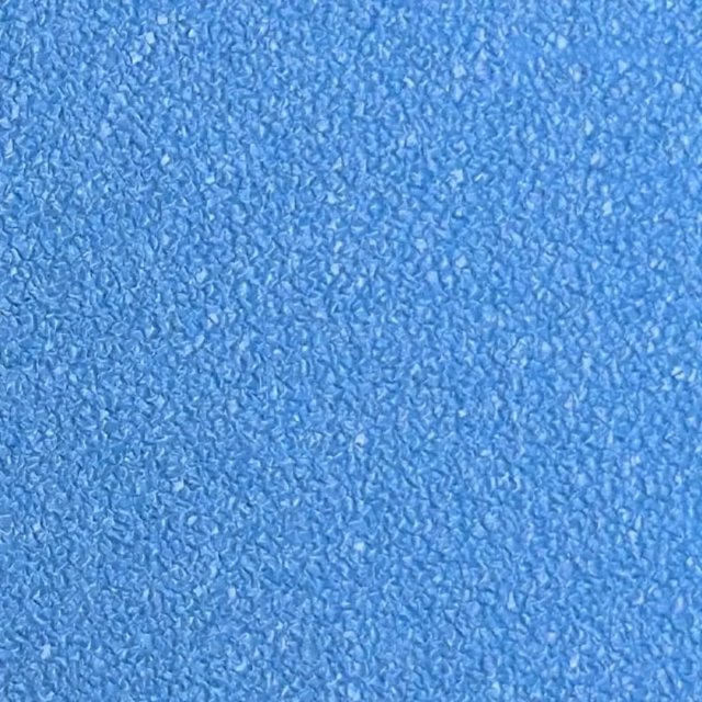 Close-up view of compact sand texture on PVC pickleball flooring surface