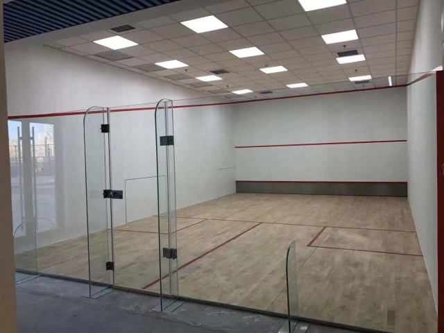 Full glass squash court construction system with tempered glass walls and indoor sports facility design