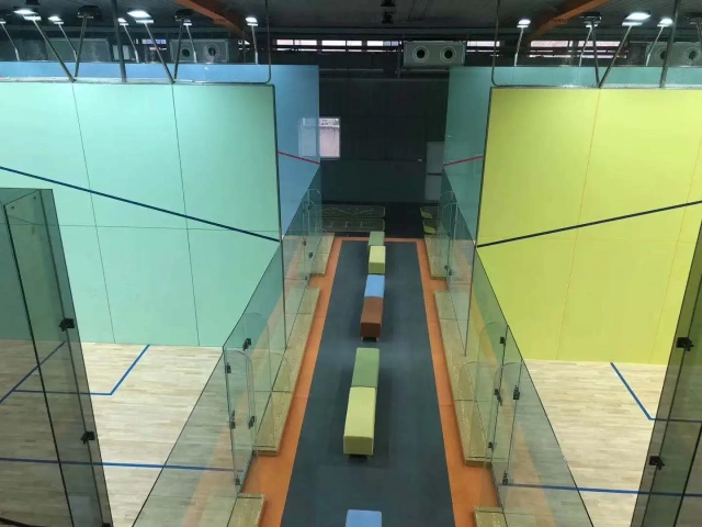 Portable squash court flooring system with professional indoor court structure