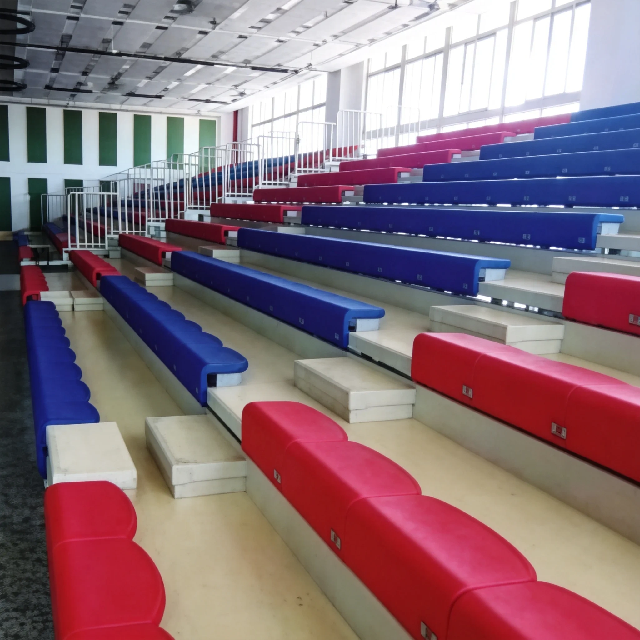SQ-9002 retractable bleachers in folded storage position for multi-purpose venues