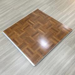 Matte parquet wood texture on portable dance floor panel for indoor events