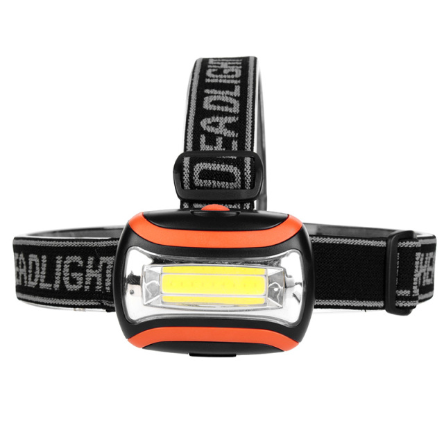 Front view of lightweight orange COB headlight showing the large-area floodlight LED panel.