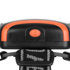 Top view detail of the orange COB headlamp showing the simple one-click power button.