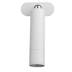 Wireless wall-mounted light head attached to a magnetic base for bedside use.