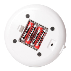 Bottom view of HG-BL012 showing the battery compartment for 4xAAA dry batteries.