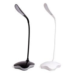 Black and white leaf-shaped LED desk lamps for student study desk.