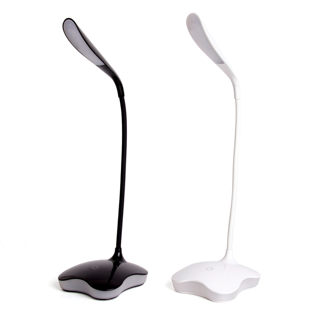 Black and white leaf-shaped LED desk lamps for student study desk.