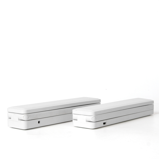 Portable travel LED desk lamp fully folded into a compact bar shape, ideal for business trips and small desks.