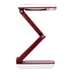 Side view of a burgundy LED lamp adjusted into a flexible Z-shape.