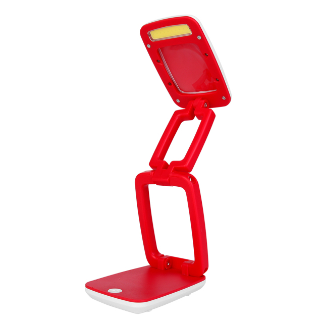 Bright red portable desk lamp in a standing position with integrated LED.