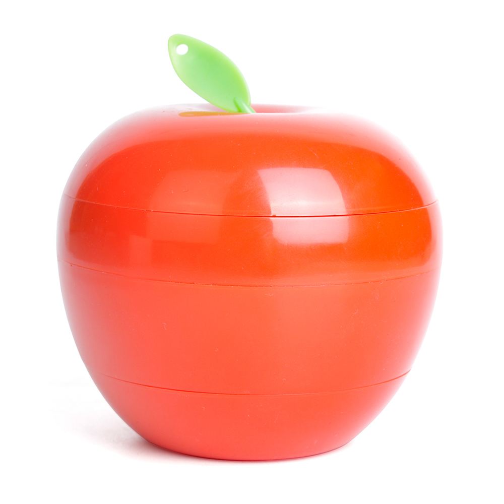 Closed red apple shaped folding LED desk lamp serving as a desktop ornament