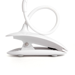 Adjustable twisted silicone gooseneck with a sturdy spring loaded clamp base.