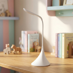 Flexible gooseneck LED desk lamp on a wooden study table with books in the background