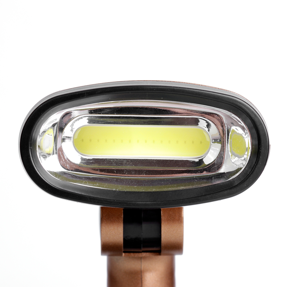 Close up view of the COB LED light head on the adjustable folding desk lamp