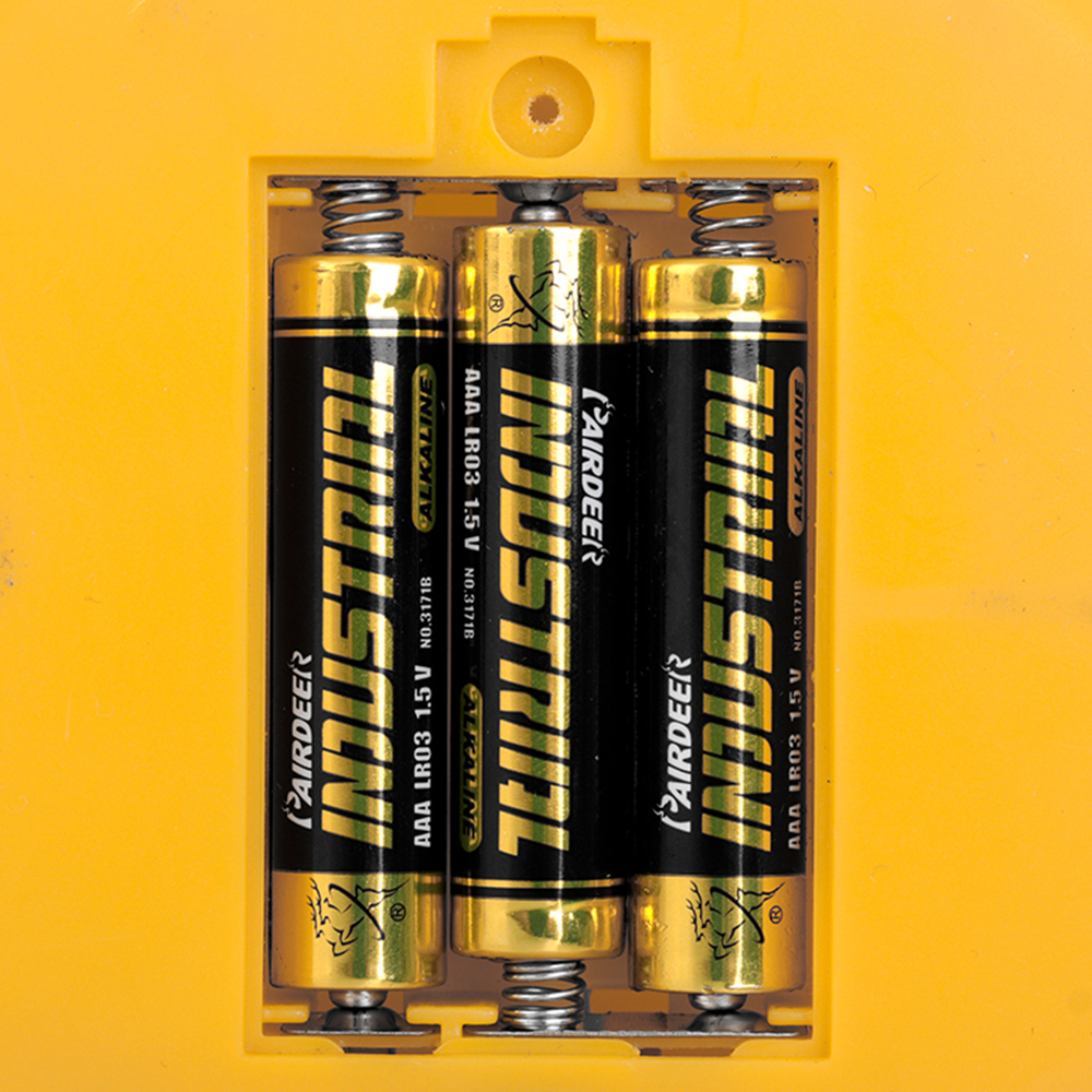 Bottom view of the mushroom-shaped LED lamp showing the battery compartment