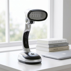 Portable folding LED desk lamp placed on a study desk for focused reading