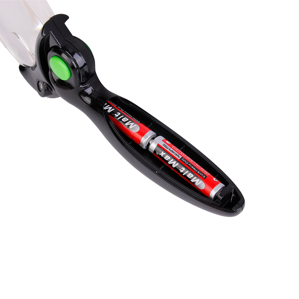 Close-up shot of the opened battery compartment inside the handle showing two AAA batteries installed