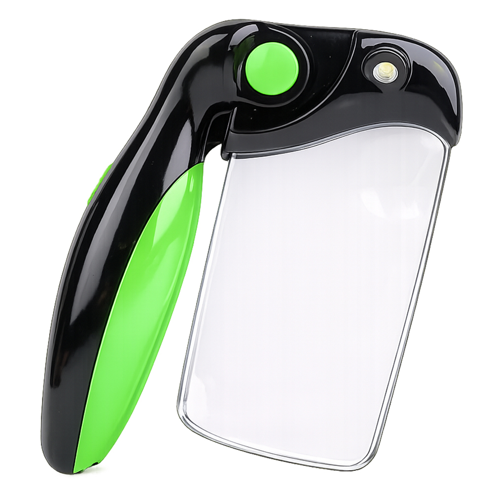 A foldable handheld magnifying glass lamp in its compact closed position with a green non-slip handle, isolated on a white background