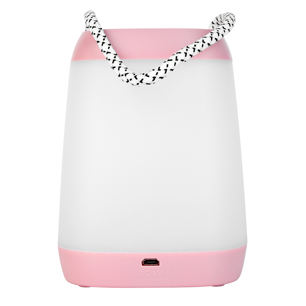 Back view of a rechargeable white and pink LED night lamp showcasing the USB charging port on the lower base