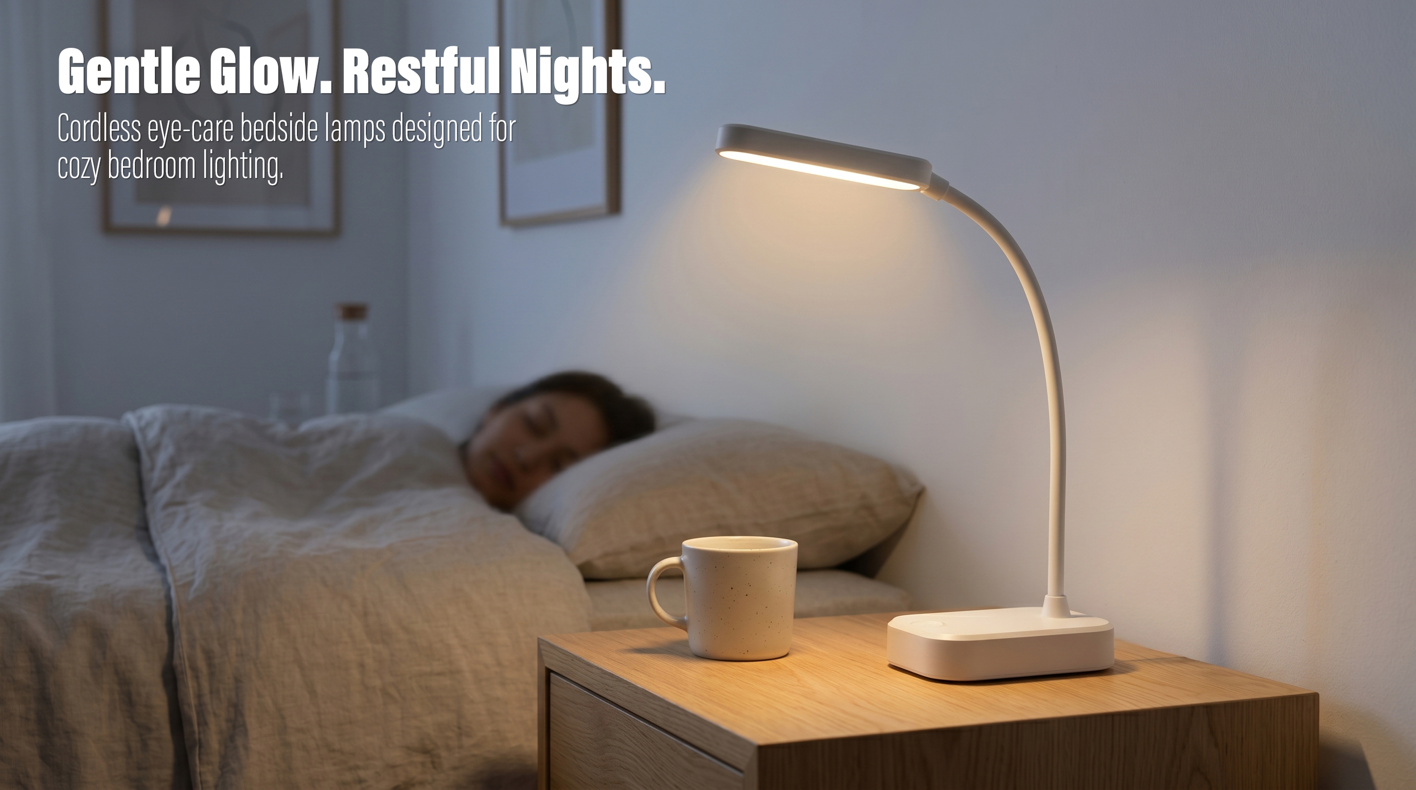 An illuminated white cordless LED desk lamp casting a warm soft glow next to a ceramic mug on a wooden nightstand in a quiet bedroom