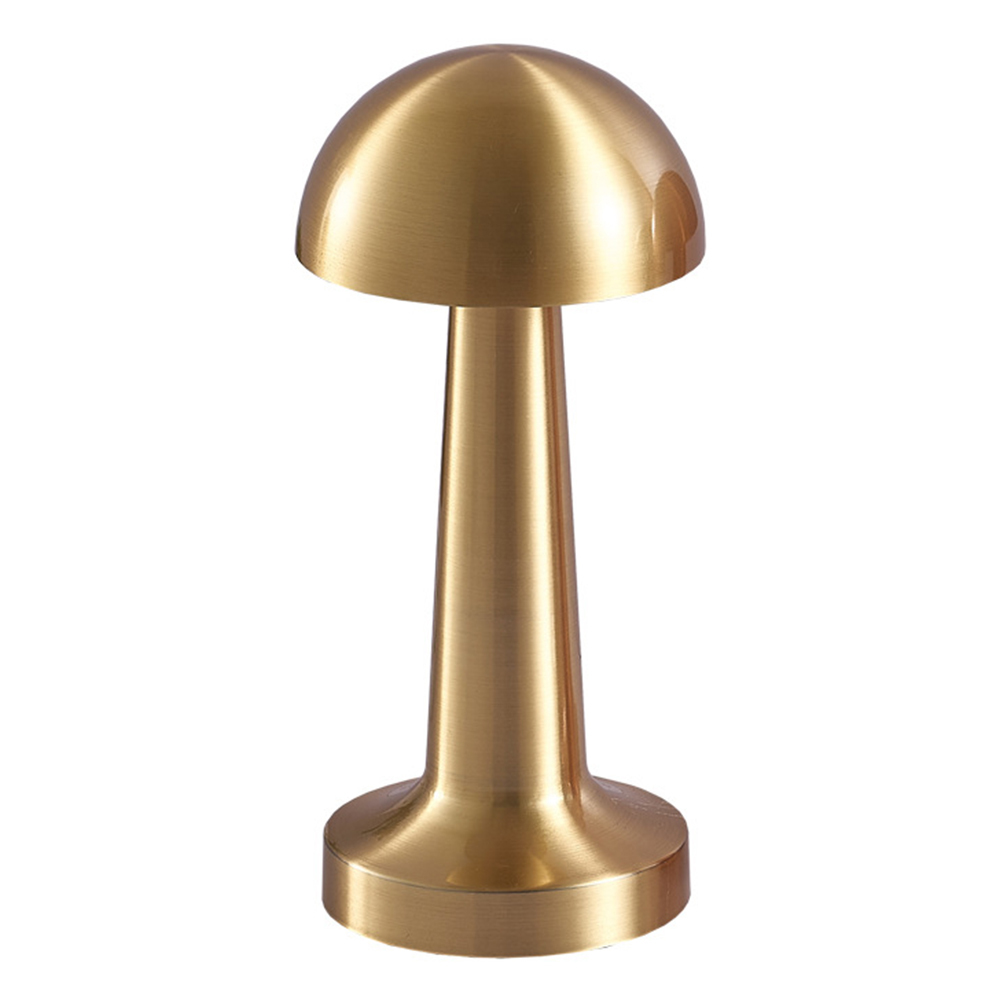 Front studio view of a brushed gold metal mushroom-shaped cordless table lamp on a white background