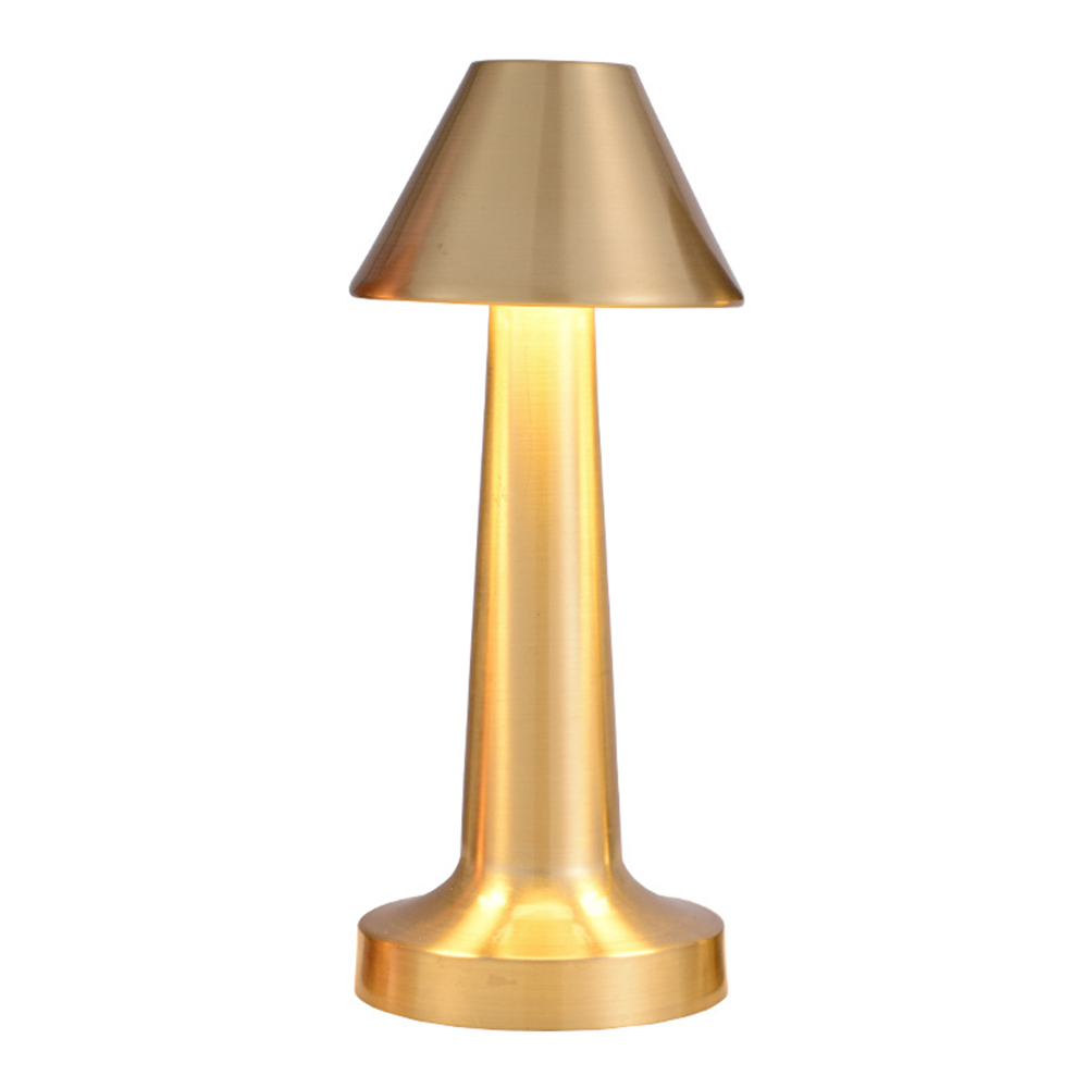 Front studio view of a sleek gold metal conical-shade rechargeable desk lamp on a white background