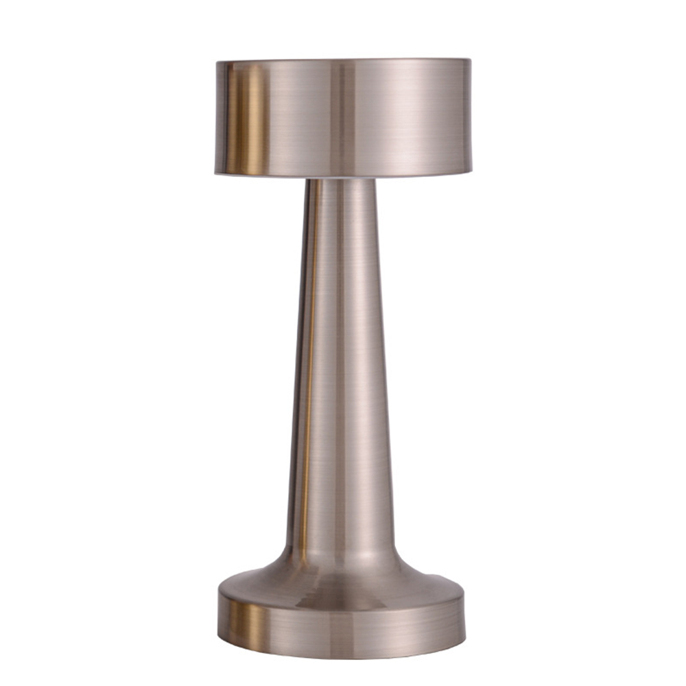 Front studio view of a geometric silver metal cylindrical-shade wireless restaurant lamp on a white background