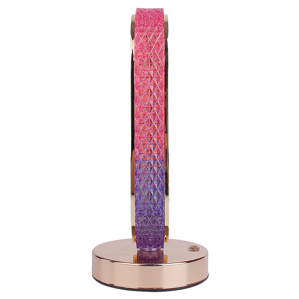 Profile studio view of a slim oval crystal desk lamp highlighting the textured diamond pattern and pink-purple gradient finish