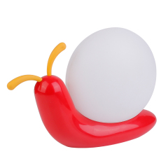 Front three-quarter studio view of a decorative red and yellow snail-shaped nursery lamp with a frosted ball shade