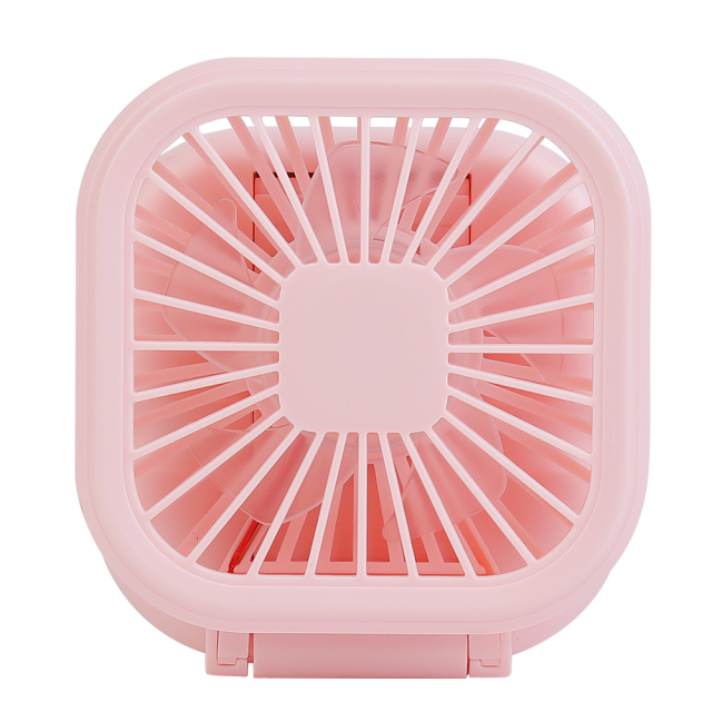 Front studio photograph of a pink mini desktop fan in a fully folded and closed position.