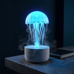A creative jellyfish desktop humidifier operating in a dark room with a vibrant blue LED glow and rising mist plumes on a textured stone table.