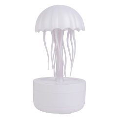 Front studio photograph of a white jellyfish-shaped desktop humidifier with tentacles and a round cylinder base.
