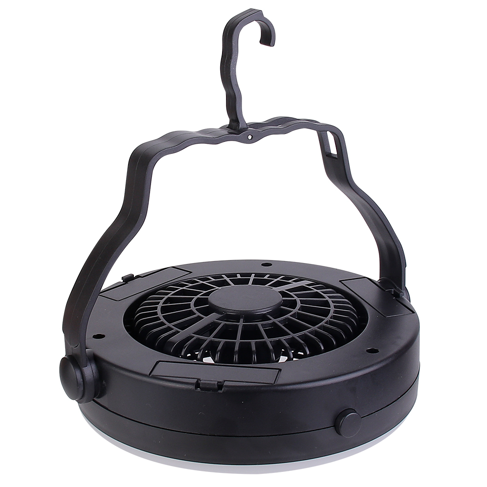 High-angle studio view of the black multi-functional tent fan resting flat to demonstrate its structural design.