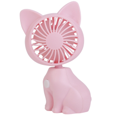 Studio photograph of the pink cat-shaped mini fan from a front-side angle with the head pointing slightly upward.