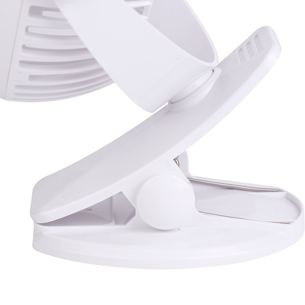 Three-quarter angled front studio view of the white desk clamp fan showing its versatile dual-jointed support arm.