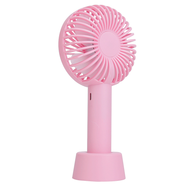 Rear-angled studio view of the pink mini travel fan showcasing the plastic housing and protective back guard.