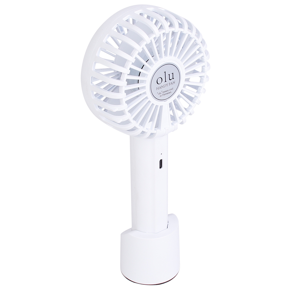 Three-quarter angled rear studio view of the white personal cooling fan showcasing the protective motor housing.
