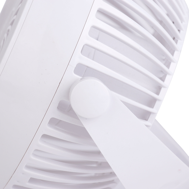 Profile side studio view of the white personal fan showing its sturdy clamp base and the adjustable hinge mechanism.