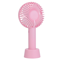 Three-quarter angled studio view of the pink portable pocket fan standing in its detachable desktop base.
